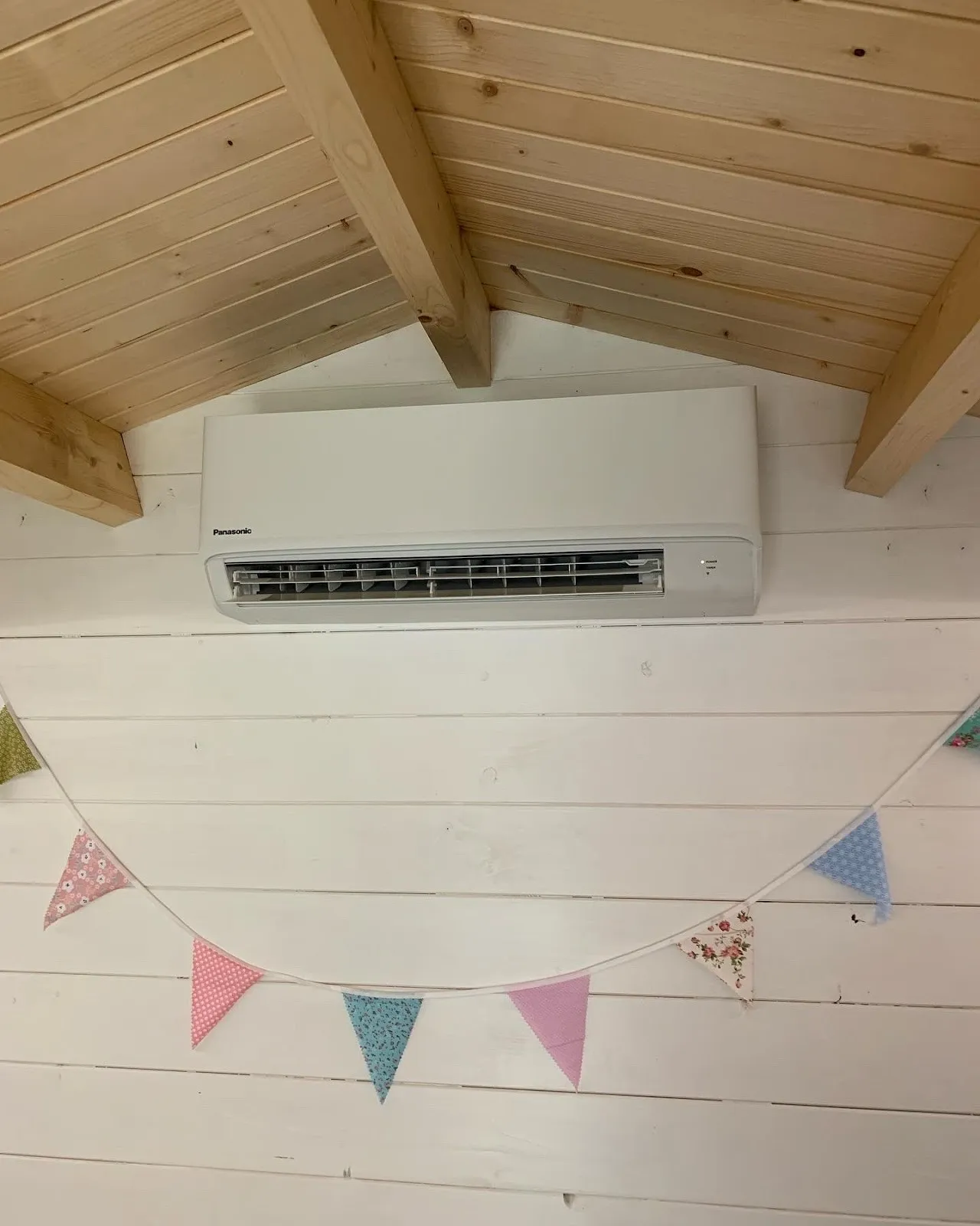 Panasonic wall unit in a garden room. Heating and cooling for a timber garden room.